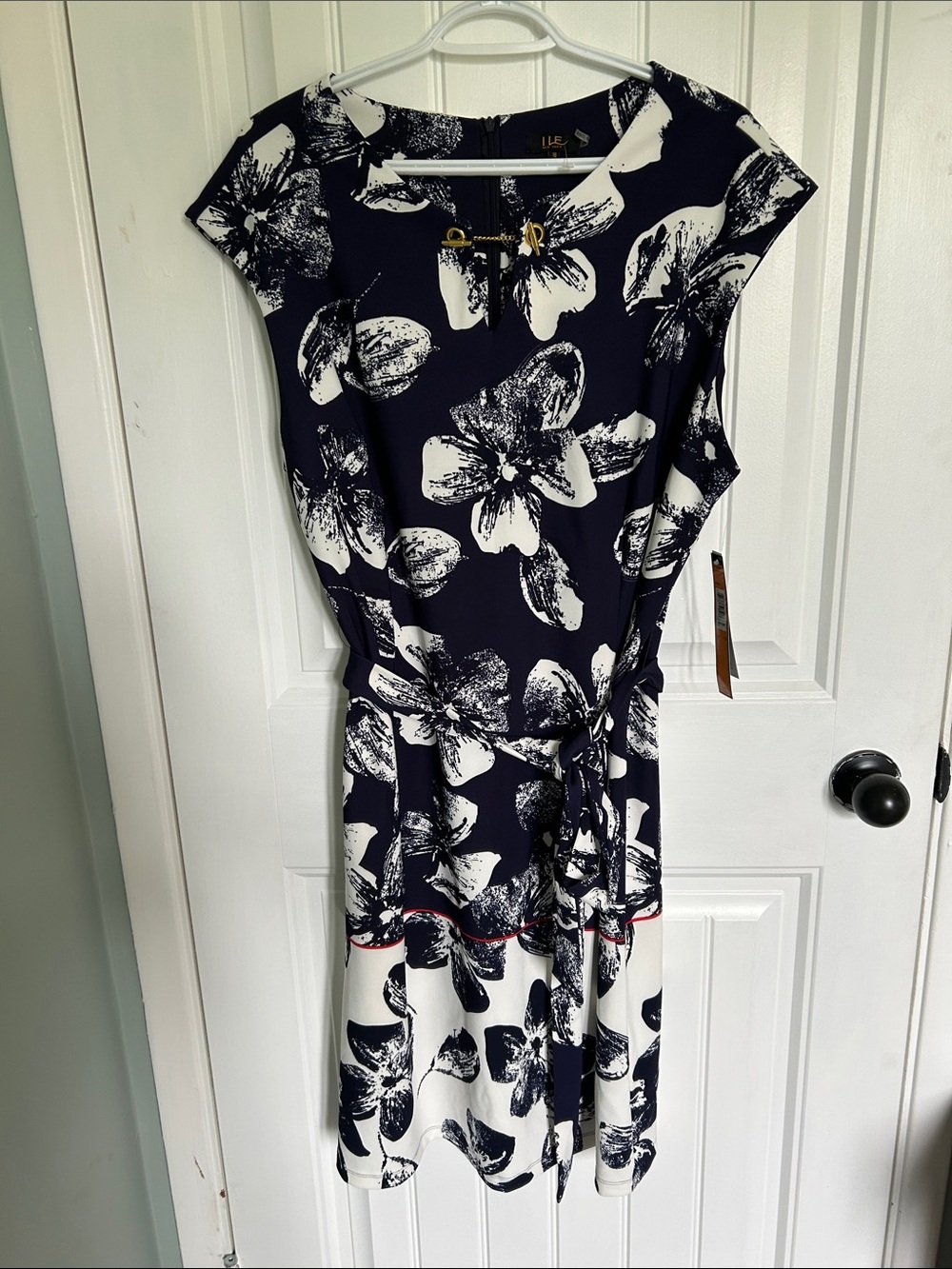 Sleeveless Navy and White Floral Tie-Waist Midi Dress by ILE New York